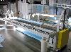  SLITTER REWINDER, 130" wide.